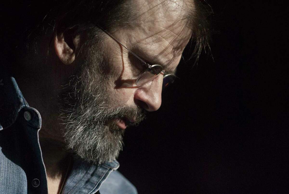Steve Earle performs on stage