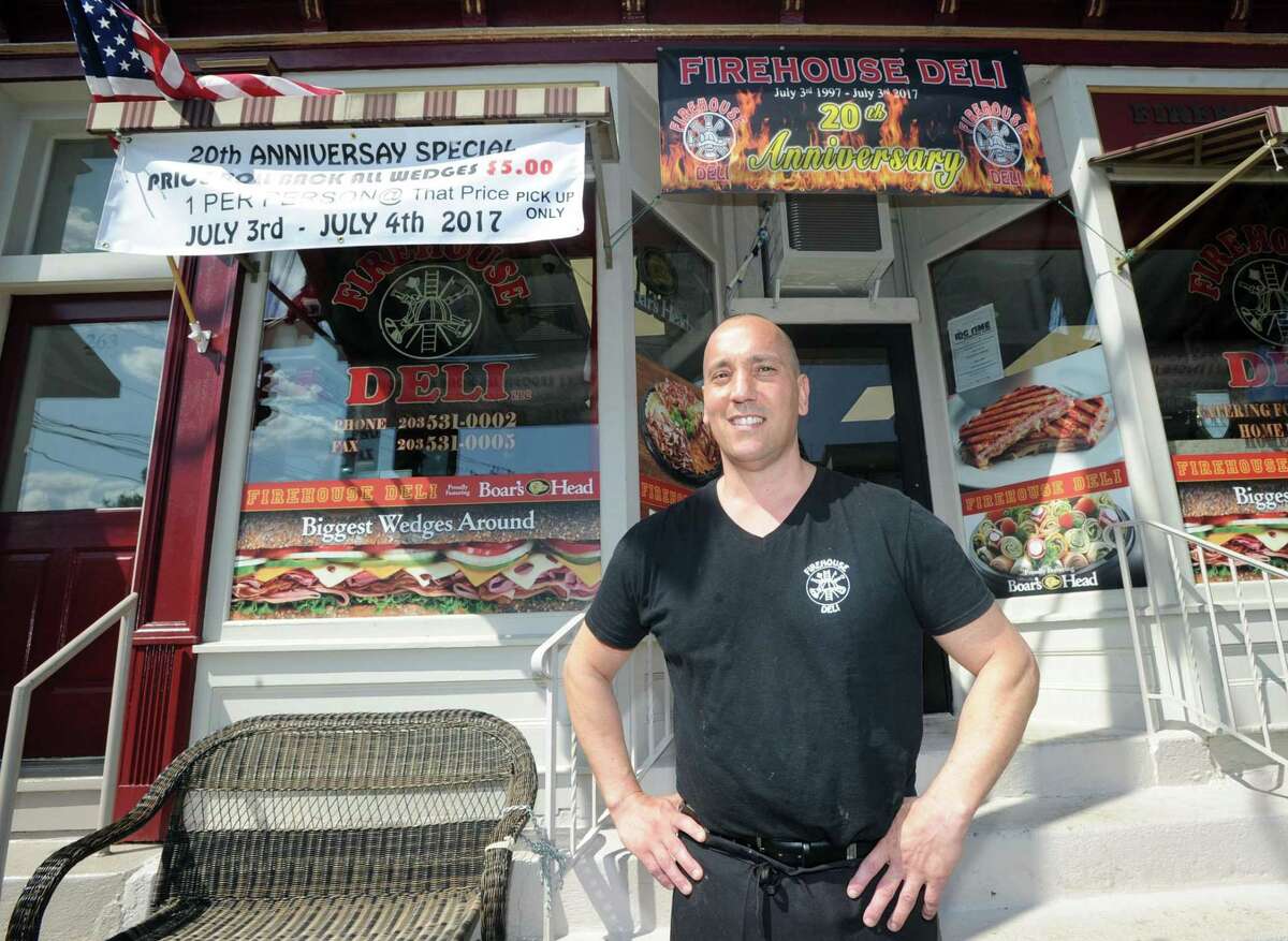 Anthony Labrosciano, Jr., in front of the Firehouse Deli in the Byram section of Greenwich, Conn., Wednesday, June 28, 2017. The deli is celebrating its 20th anniversary July 3rd and 4th when all wedges will be rolled back to the 1990s price of $5.00.