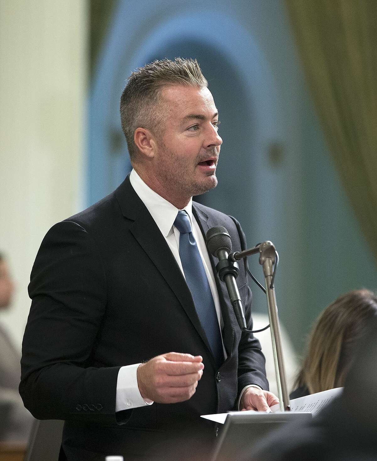 FILE - In this Aug. 18, 2016 file photo, California Assemblyman Travis Allen, R-Huntington Beach, addresses the Assembly in Sacramento, Calif. Allen said Thursday, June 22, 2017, he's entering the 2018 California gubernatorial that has largely been dominated by Democrats. (AP Photo/Rich Pedroncelli, file)