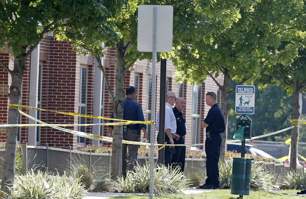 Police officers secure the scene of an officer-involved shooting near San Antonio College Thursday June 29, 2017.