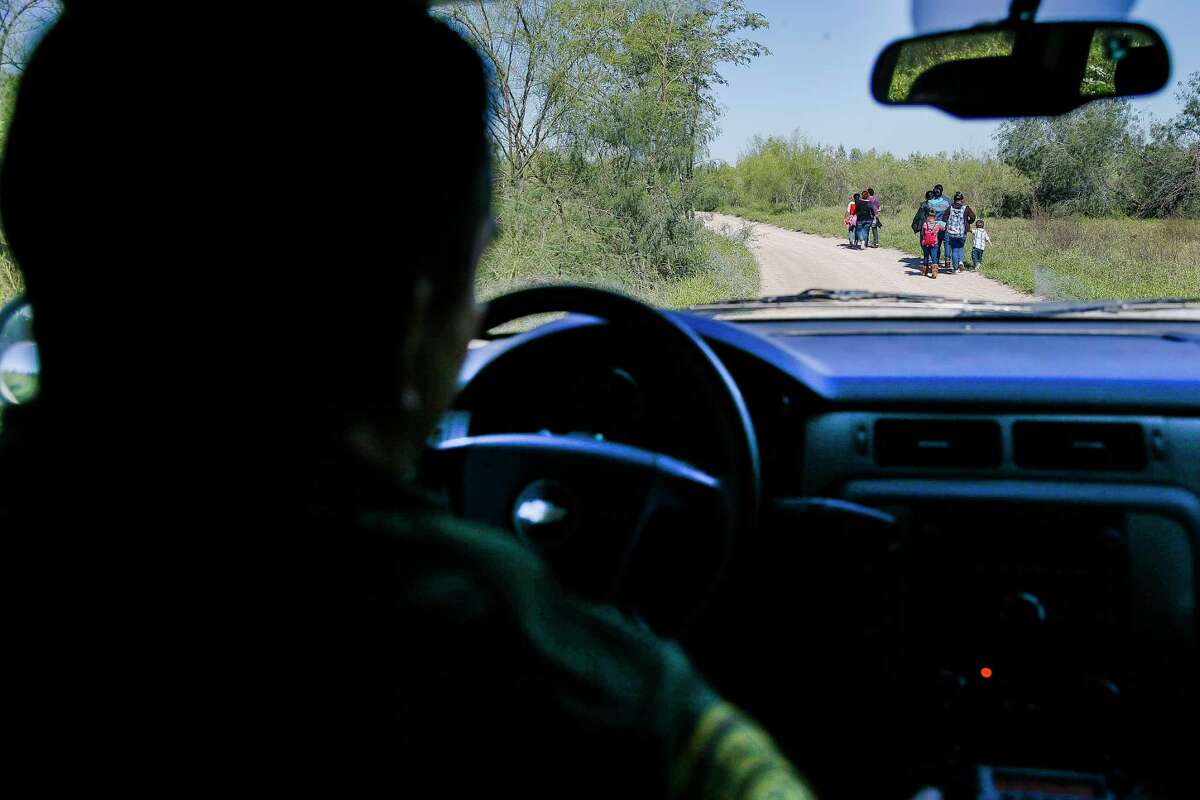 Border Patrol agent Isaac Villegas drives up on a group of immigrants in McAllen ﻿who just crossed into the﻿ U.S. Most are fleeing violence from El Salvador, Honduras and Guatemala.﻿