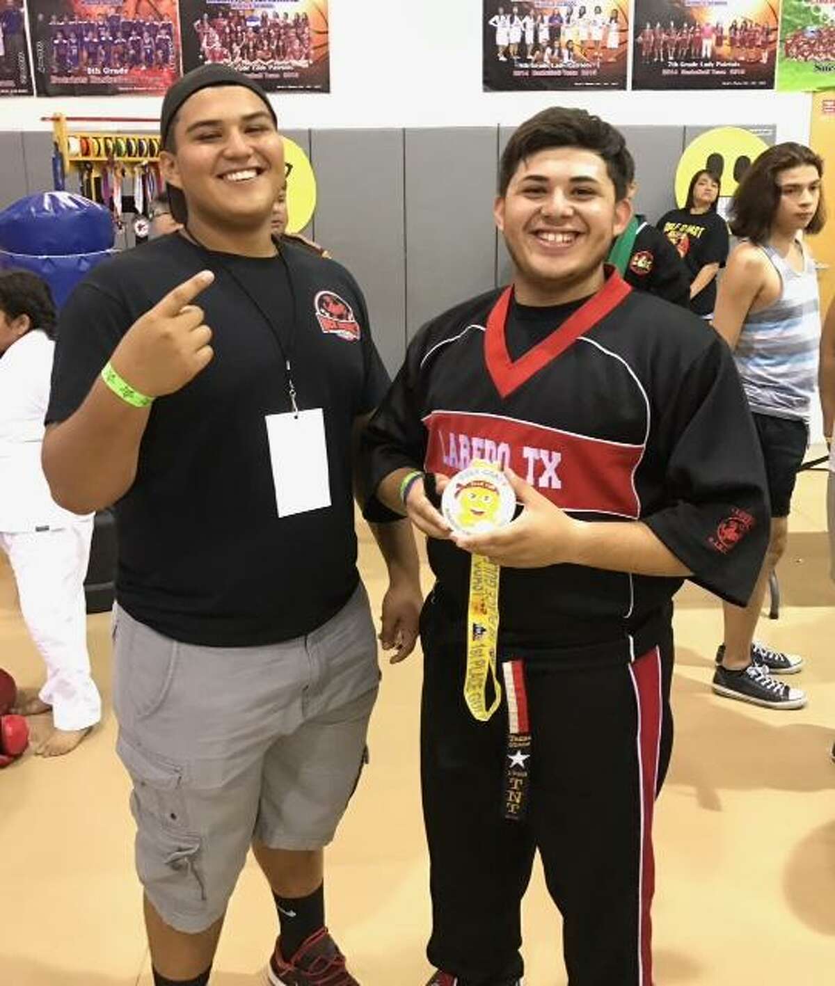 Led by coach Brian Gutierrez, left, the Team Guerra tournament karate team competed at the Gulf Coast Karate Championships in San Benito. Branden Gutierrez is one of its 15 team members as every one medaled.