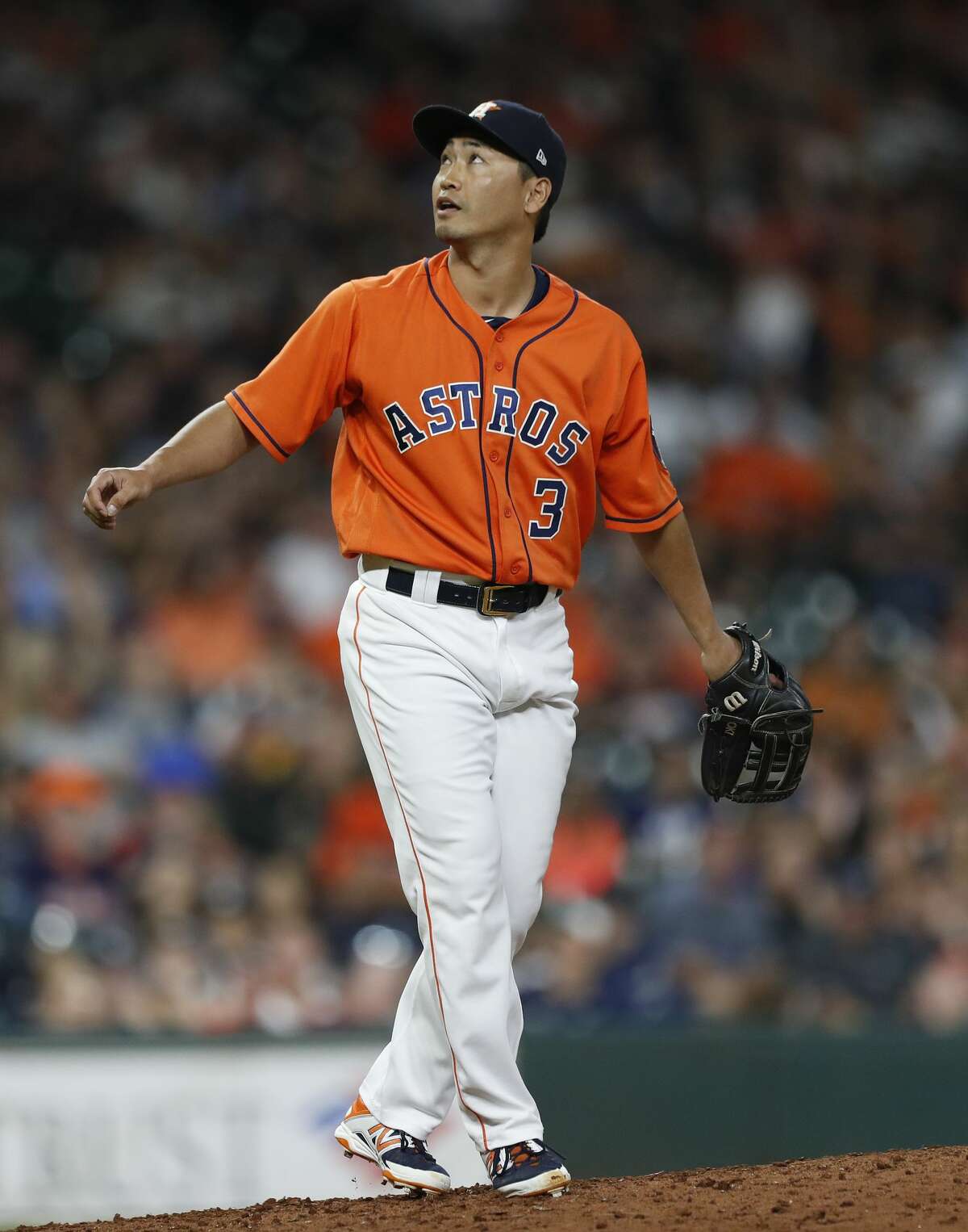 Houston Astros left fielder Norichika Aoki (3) pitches in relief during the ninth inning of an MLB baseball game at Minute Maid Park, Friday, June, 30, 2017. ( Karen Warren / Houston Chronicle )