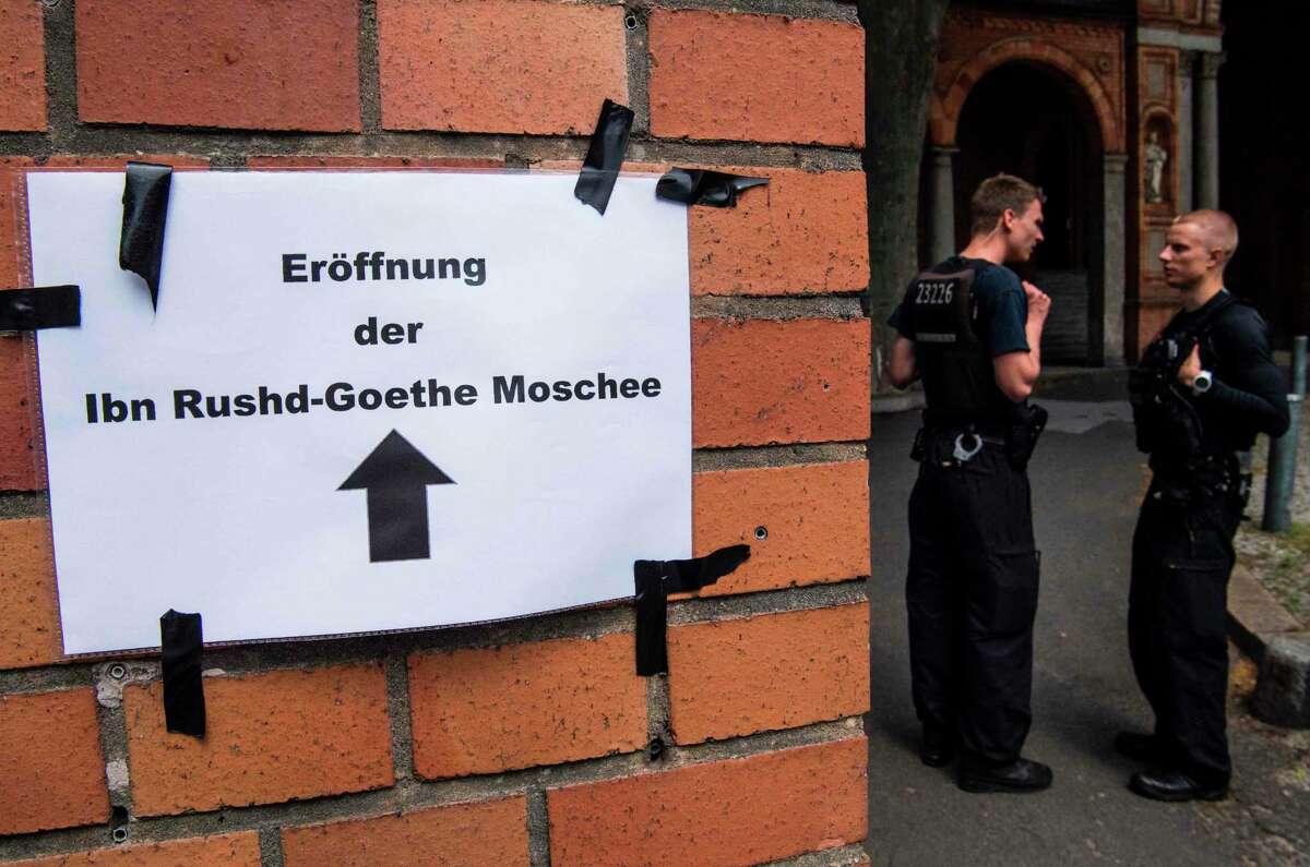 Police officers are posted at the entrance of the Ibn Rushd-Goethe-mosque in the St. Johannis Protestant church in Berlin on June 16, 2017. Founded by Seyran Ates, the mosque aims to establish a humanistic, secular and liberal reading of Islam. / AFP PHOTO / John MACDOUGALLJOHN MACDOUGALL/AFP/Getty Images