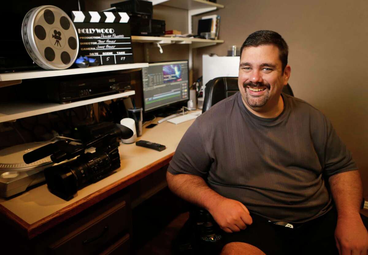Troy Haney, who has cerebral palsy, works from his home as a video editor and producer for Prayer Powered Productions. His projects are usually for churches and the YMCA.