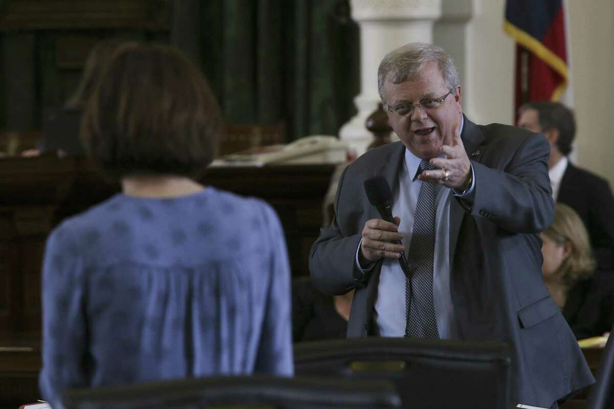 Texas Senator Paul Bettencourt, R-Houston, answers a question from Sen. Lois Kolkhorst, R-Brenham, during a discussion of his property tax bill during the regular session, Tuesday, March 21, 2017. The bill, SB2, puts further restrictions on city and county property tax revenues and was approved by the senate. The bill will move on to the House of Representatives.