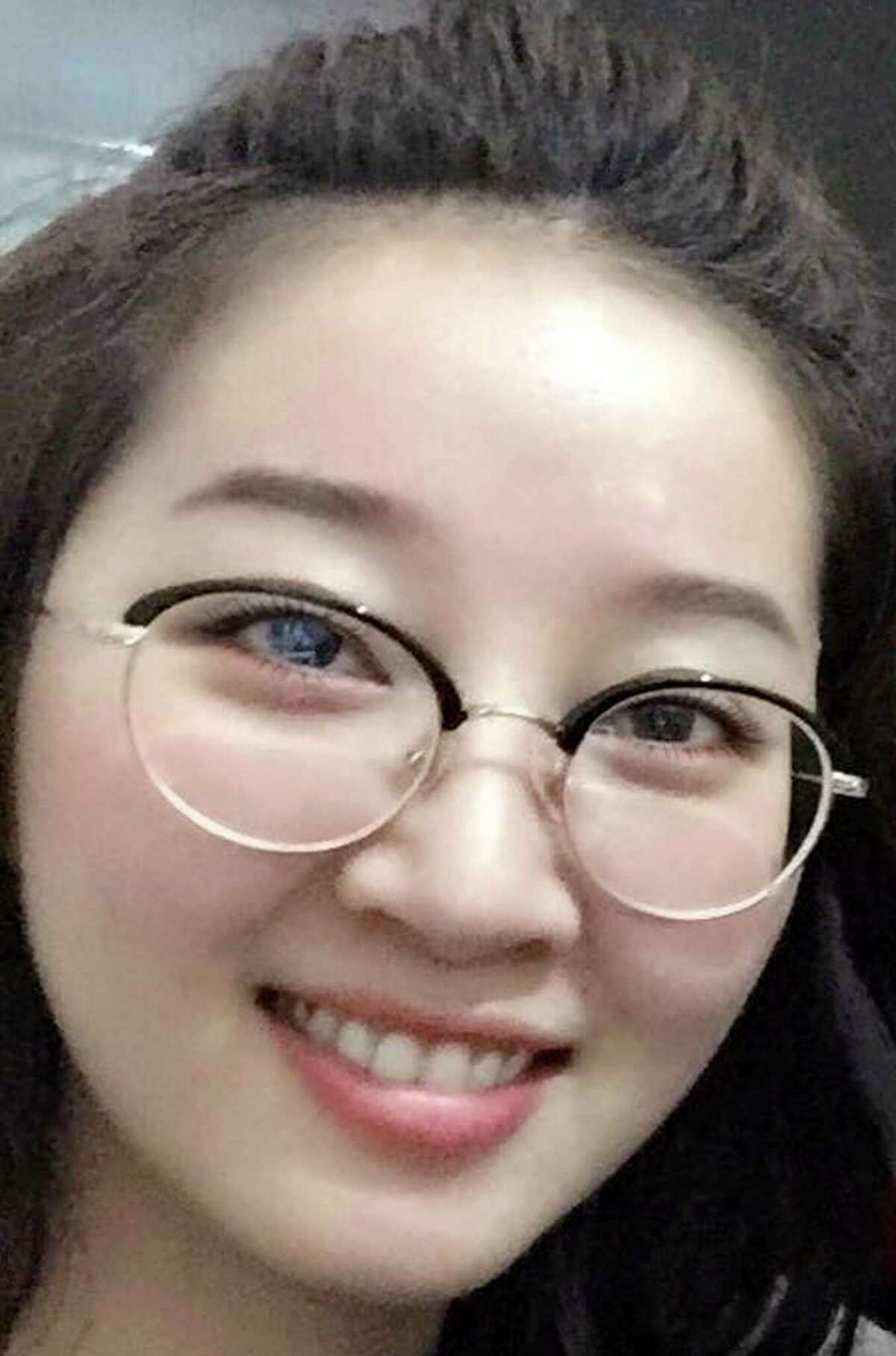 This undated photo provided by the University of Illinois Police Department shows Yingying Zhang. Police said the FBI is investigating the disappearance of Zhang, a Chinese woman from a central Illinois university town, as a kidnapping. Zhang was about a month into a yearlong appointment at the University of Illinois' Urbana-Champaign when she disappeared June 9, 2017. (Courtesy of the University of Illinois Police Department via AP)