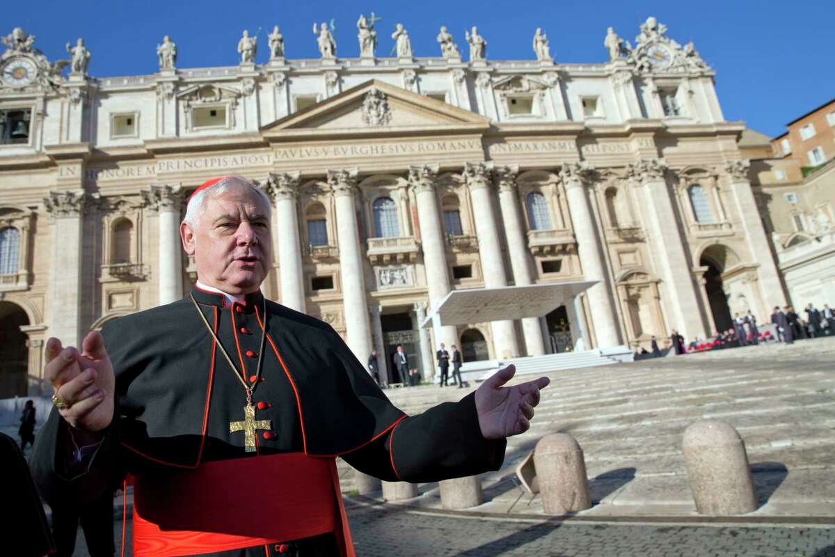 FILE - In this Wednesday, Nov. 19, 2014 file photo, Cardinal Gerhard Ludwig Mueller arrives in St. Peter's Square at the Vatican to attend the weekly general audience. Pope Francis has declined to renew the mandate of the Vatican's conservative doctrine chief, tapping instead the No. 2 to lead the powerful congregation that handles sex abuse cases and guarantees Catholic orthodoxy around the world. In a short statement Saturday, July , 2017, the Vatican said Francis thanked Cardinal Gerhard Mueller for his service. Mueller's five-year term ends this weekend and he turns 75 in December, the normal retirement age for bishops. (AP Photo/Andrew Medichini, File)