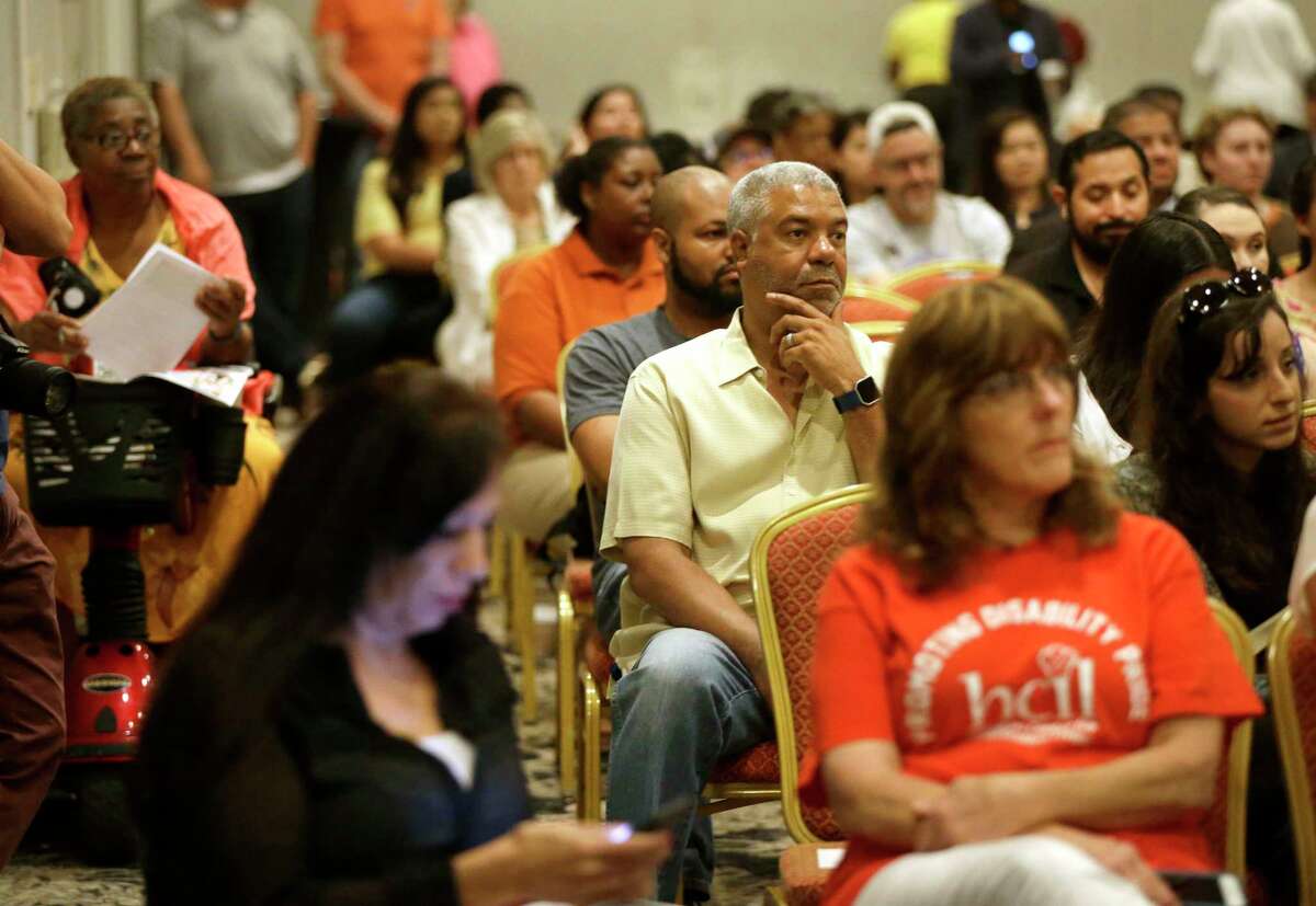 People attend a public forum on medicaid held by Congressman Al Green along with the Children's Defense Fund-Texas, Houston Women March, Community Health Choice, HOPE Clinic, and other groups at the Crowne Plaza Hotel, 8686 Kirby Dr., Saturday, July 1, 2017, in Houston. ( Melissa Phillip / Houston Chronicle )