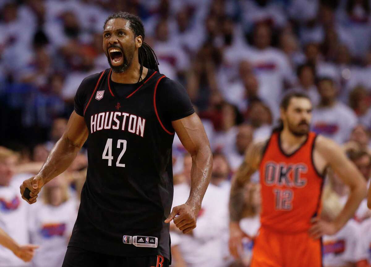 Houston Rockets center Nene (42) celebrates a basket in front of Oklahoma City Thunder center Steven Adams (12) in the fourth quarter of Game 4 of a first-round NBA basketball playoff series in Oklahoma City, Sunday, April 23, 2017. Houston won 113-109. (AP Photo/Sue Ogrocki)