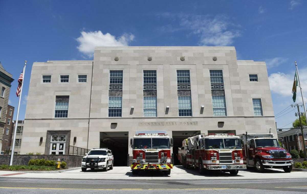 FILE — Fire engines sit outside the Central Fire Station after its official opening in Greenwich, Conn. Wednesday, May 24, 2017. 