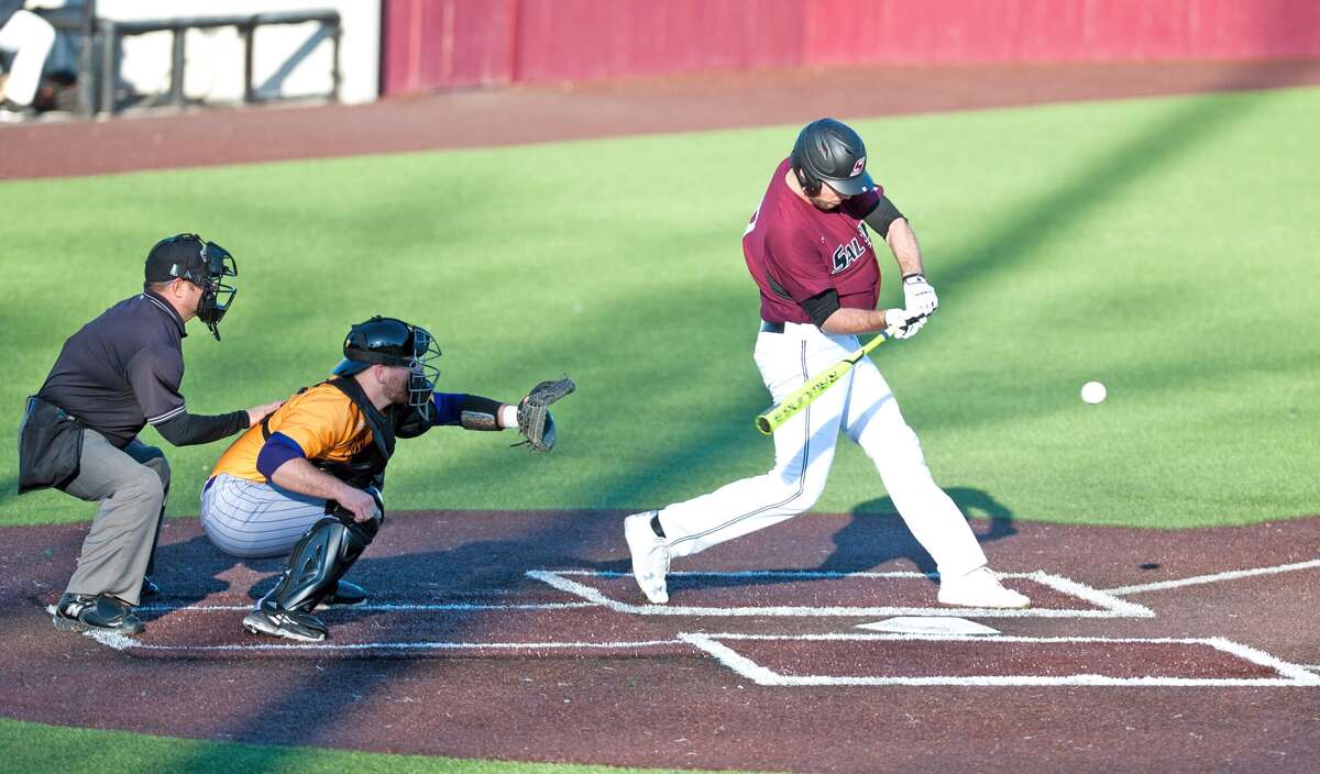 Drew Curtis of Southern Illinois University Carbondale, right, swings at a pitch during a game this spring. Curtis is a 2013 Edwardsville High School graduate.
