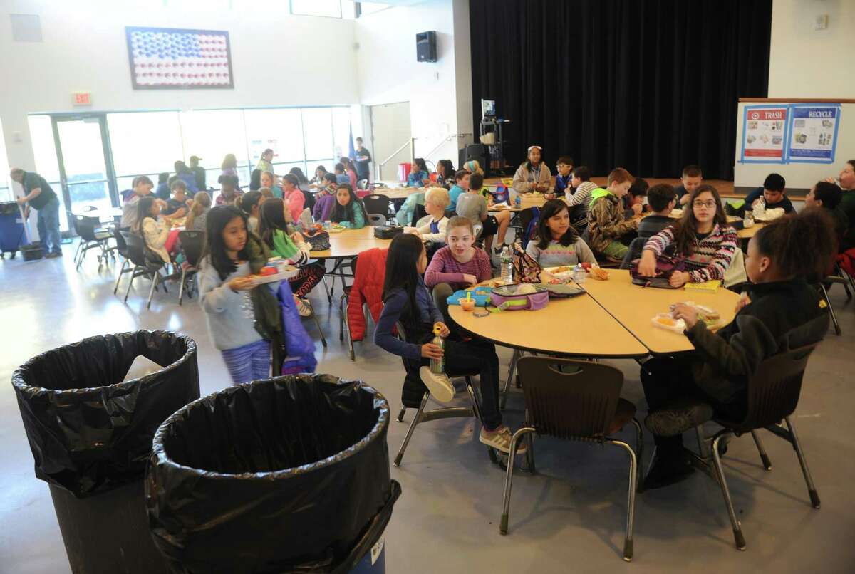 Students eat lunch at Hamilton Avenue School in the Chickahominy section of Greenwich, Conn. Wednesday, March 22, 2017. Hamilton Avenue is one of the Greenwich schools currently using a composting system, and Greenwich High School is looking to soon begin composting as well.