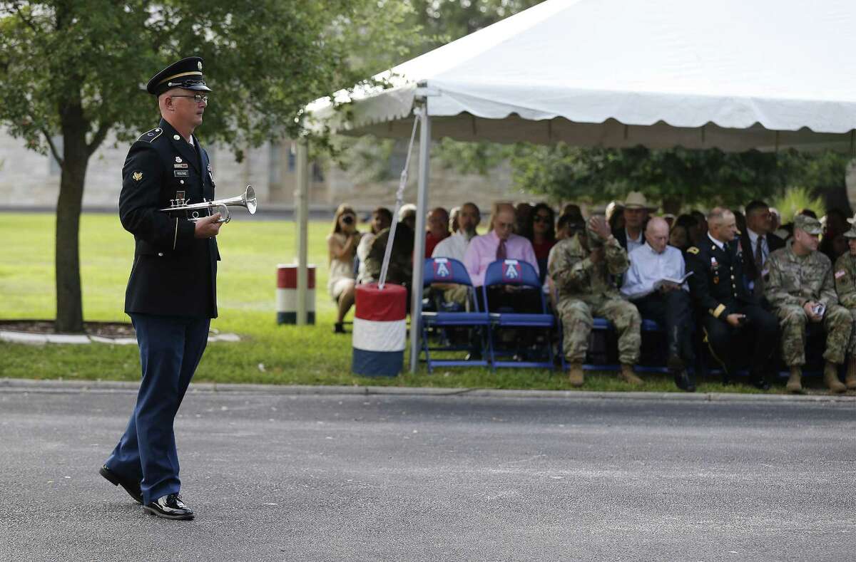 Spc. Timothy Rogers prepares to play his trumpet to commence a retirement ceremony at Fort Sam Houston on Thursday, June 29, 2017. In San Antonio, a U.S. Army town going back to statehood, one of its grand traditions for more than a century has been singing patriotic songs at various events to the strains of a band from Fort Sam Houston. That era is coming to an end. The Army is breaking up the 323rd Army Band, called Fort Sams Own, ending a run that has seen musicians from the post serenading everything from command change ceremonies and funerals for heroic soldiers to downtown parades.(Kin Man Hui/San Antonio Express-News)