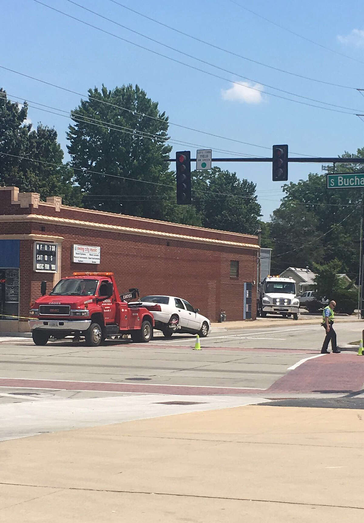 Two vehicles were involved in a collision early Monday afternoon, damaging a streetlight at the intersection of East Schwarz Street and South Buchanan Street.