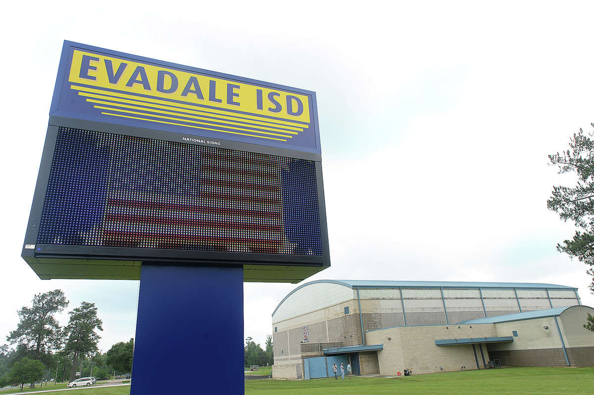 A new sign has been installed at the entry to Evadale High School. The digital sign features a scrolling display of school information, an American flag, and a Confederate flag with the motto "Home of the Fighting Rebels." The sign, which replaces one featuring their crest with Confederate flag, has some residents upset. Photo taken Friday, April 29, 2016 Kim Brent/The Enterprise