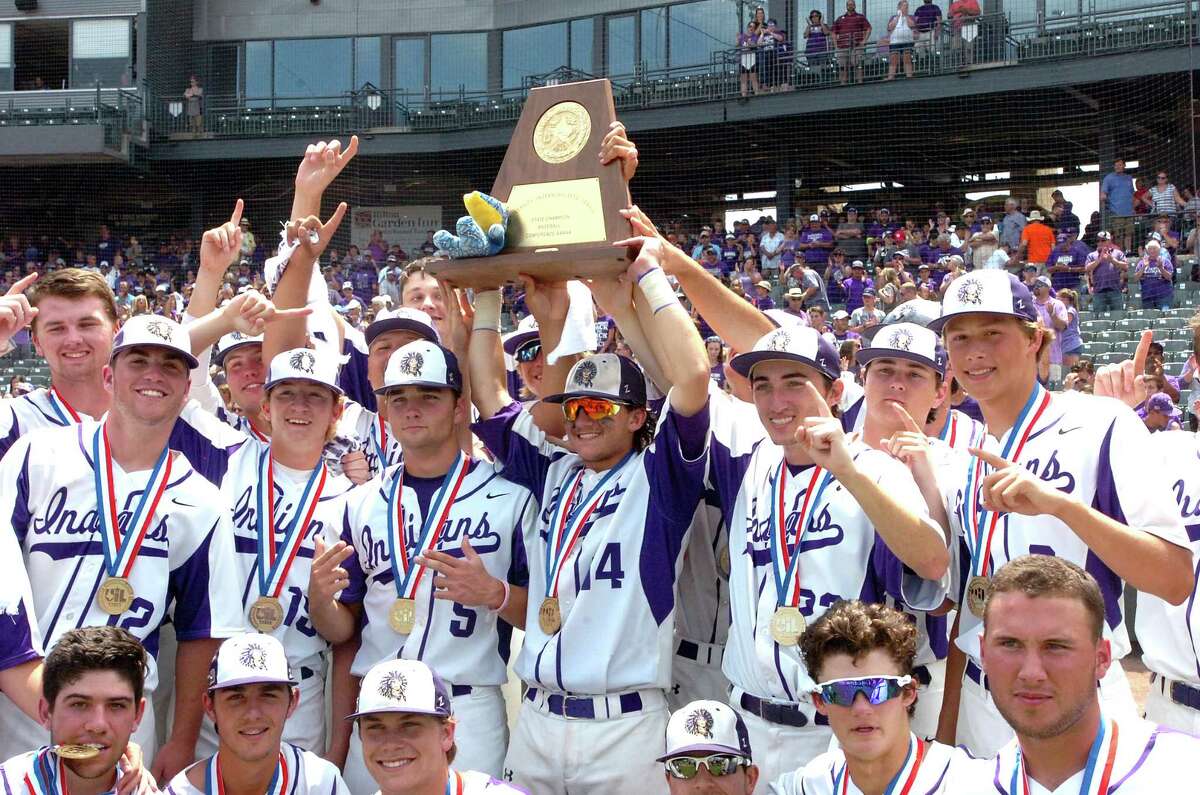 The Port Neches-Groves baseball team celebrates with the Class 5A state baseball championship trophy after the Indians defeated Grapevine, 4-2, on Saturday, June 10, at Dell Diamond in Round Rock. (Mike Tobias/The Enterprise)