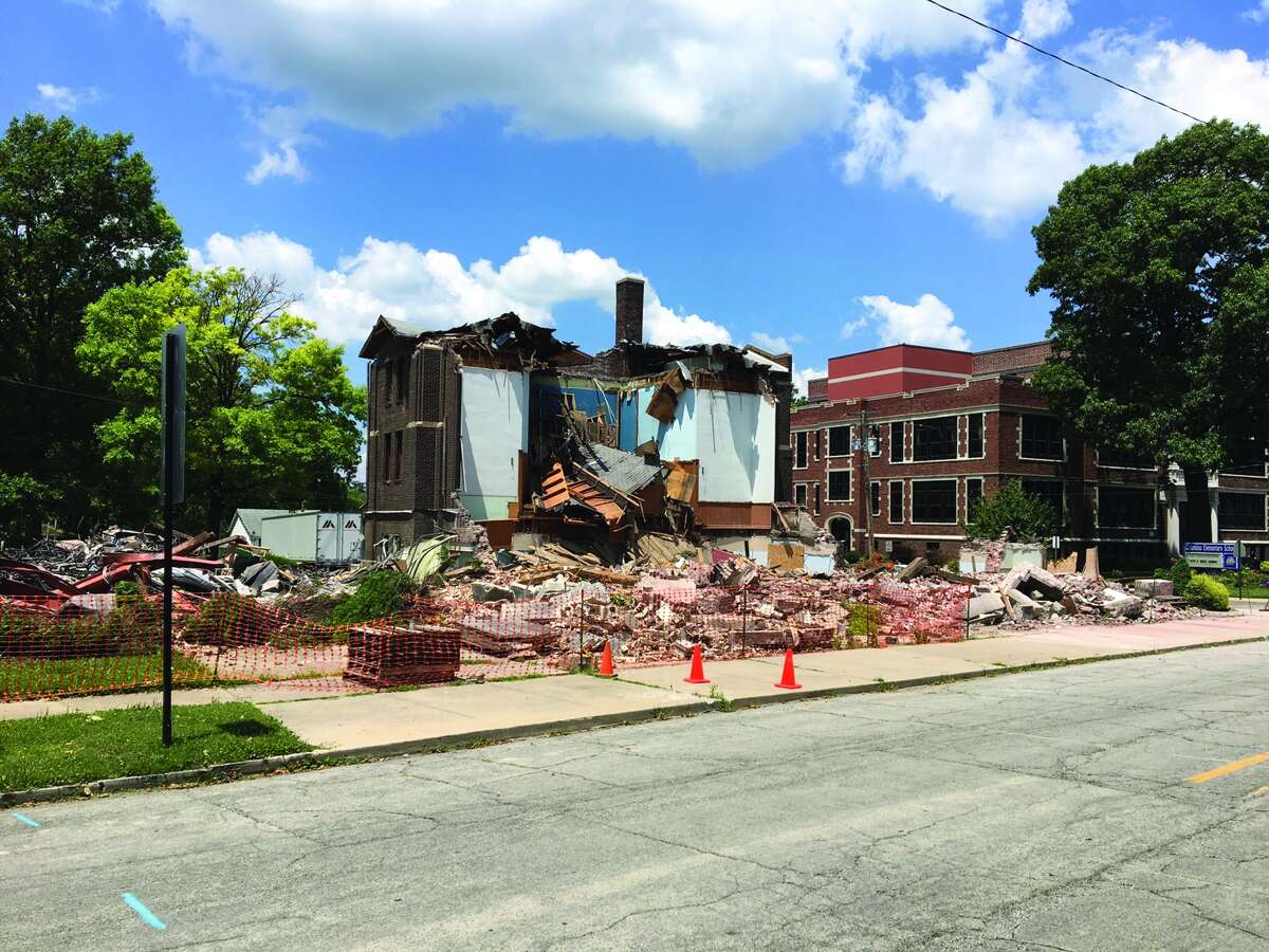 Demolition of the former First Presbyterian Church on North Kansas Street began Monday morning. First Presbyterian Church has moved to a new facility on Ridgeview Road. Once the demolition is complete, the space will be used for a parking lot for Columbus Elementary School. Photo by John Sommerhof.