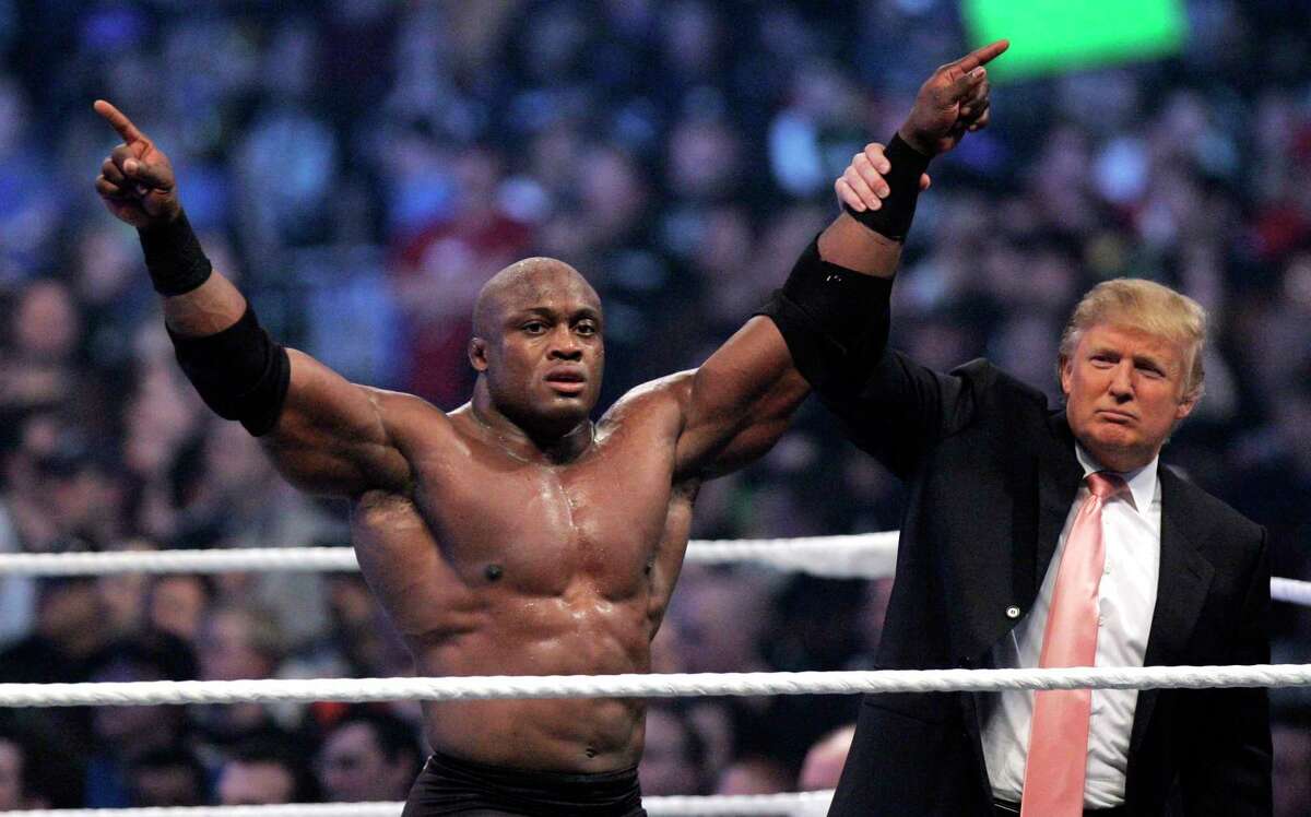 ﻿Donald Trump, right, shown with Bobby Lashley, is borrowing a page from TV wrestling tactics.﻿