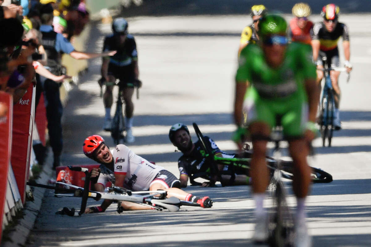 Germany's John Degenkolb, left, and Great Britain's Mark Cavendish got the worst of a crash late in Stage 4 on Tuesday that was caused by Slovakia's Peter Sagan and led to the world champion's disqualification.