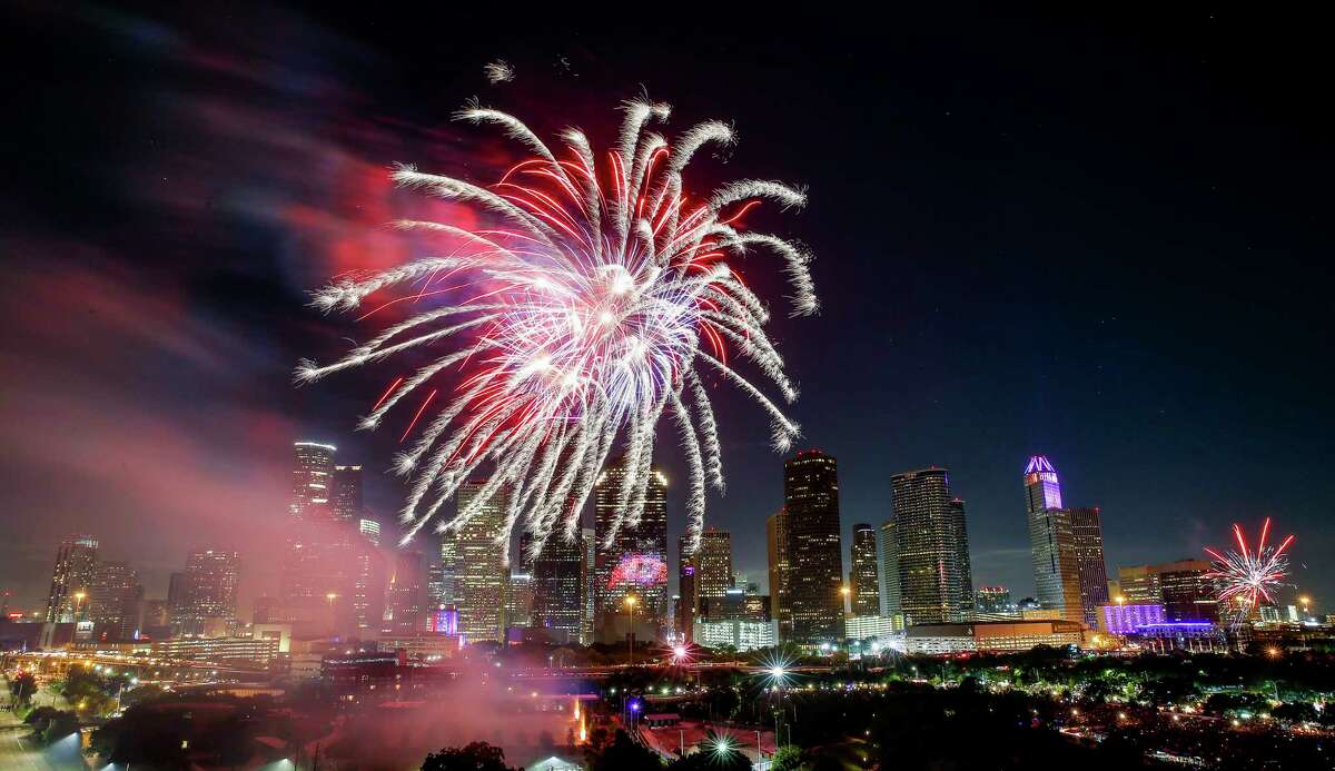 Fireworks shoot off in front of the Houston skyline for the Freedom over Texas Fireworks Spectacular Tuesday, July 4, 2017 in Houston.