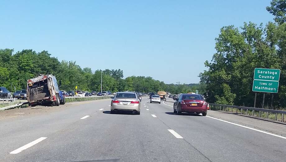 Garbage truck crashes on Northway, slows traffic at Twin