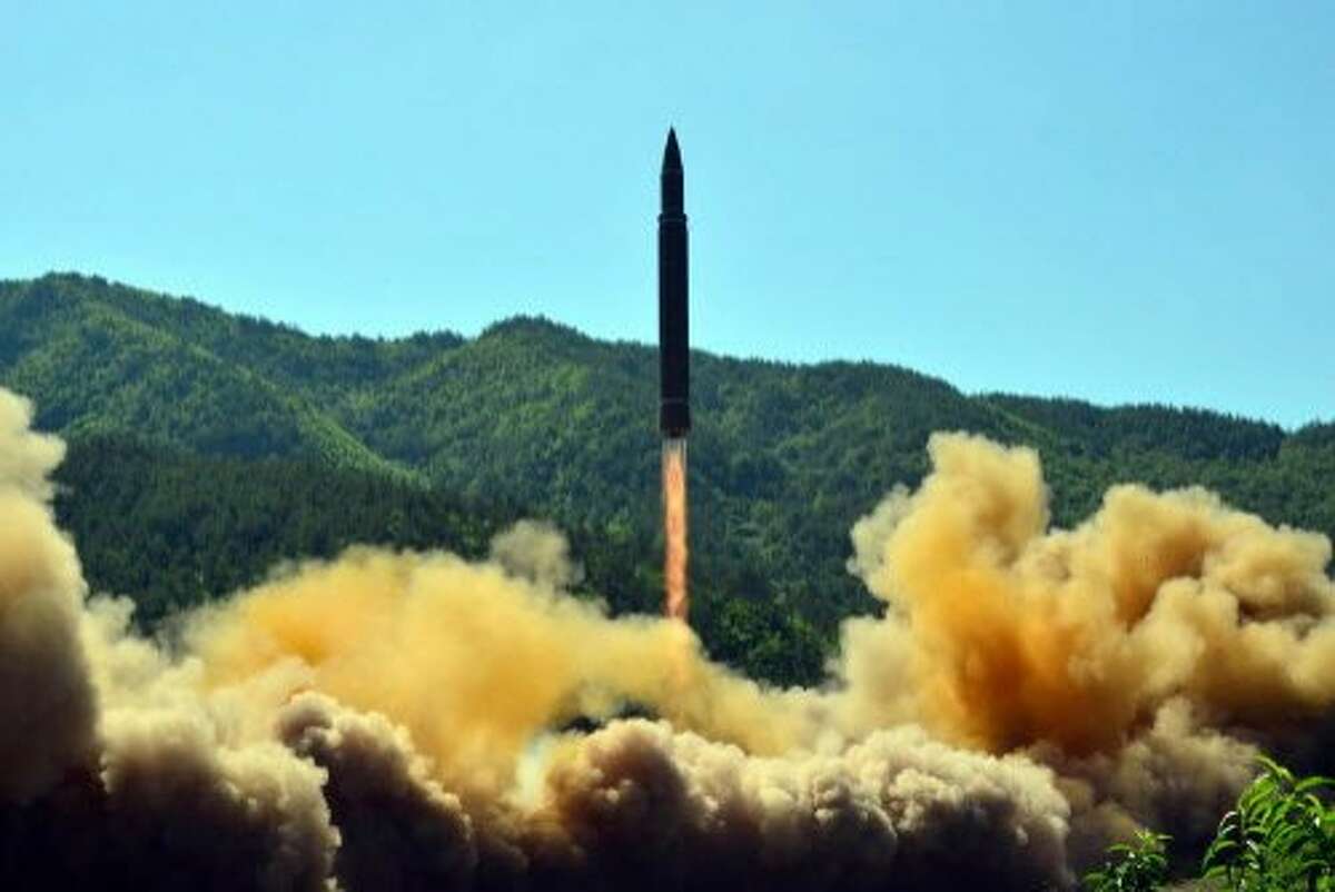 TOPSHOT - This picture taken on July 4, 2017 and released by North Korea's official Korean Central News Agency (KCNA) on July 5, 2017 shows the successful test-fire of the intercontinental ballistic missile Hwasong-14 at an undisclosed location. South Korea and the United States fired off missiles on July 5 simulating a precision strike against North Korea's leadership, in response to a landmark ICBM test described by Kim Jong-Un as a gift to "American bastards". / AFP PHOTO / KCNA VIA KNS / STR / South Korea OUT / REPUBLIC OF KOREA OUT ---EDITORS NOTE--- RESTRICTED TO EDITORIAL USE - MANDATORY CREDIT "AFP PHOTO/KCNA VIA KNS" - NO MARKETING NO ADVERTISING CAMPAIGNS - DISTRIBUTED AS A SERVICE TO CLIENTS THIS PICTURE WAS MADE AVAILABLE BY A THIRD PARTY. AFP CAN NOT INDEPENDENTLY VERIFY THE AUTHENTICITY, LOCATION, DATE AND CONTENT OF THIS IMAGE. THIS PHOTO IS DISTRIBUTED EXACTLY AS RECEIVED BY AFP. / STR/AFP/Getty Images