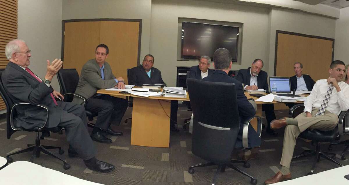 Pasadena Second Century Corporation executive director Paul Davis talks with board president Steve Cote and other board members at a meeting held April 6. Pictured from left: Davis, Cote, Ernesto Paredes, Emilio Carmona, Brad French, Rick Lord, Randy Drake and Ornaldo Ybarra. (Note: Ybarra was absent from the June 29 meeting.)