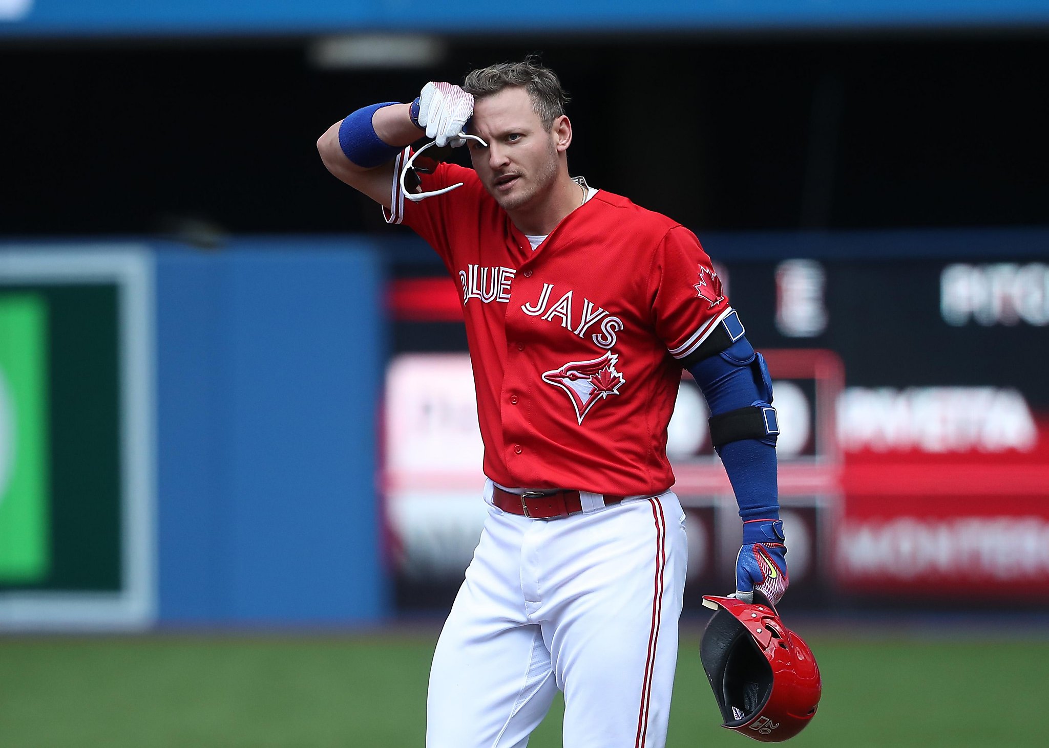 Josh Donaldson #20 of the Toronto Blue Jays reacts as he is