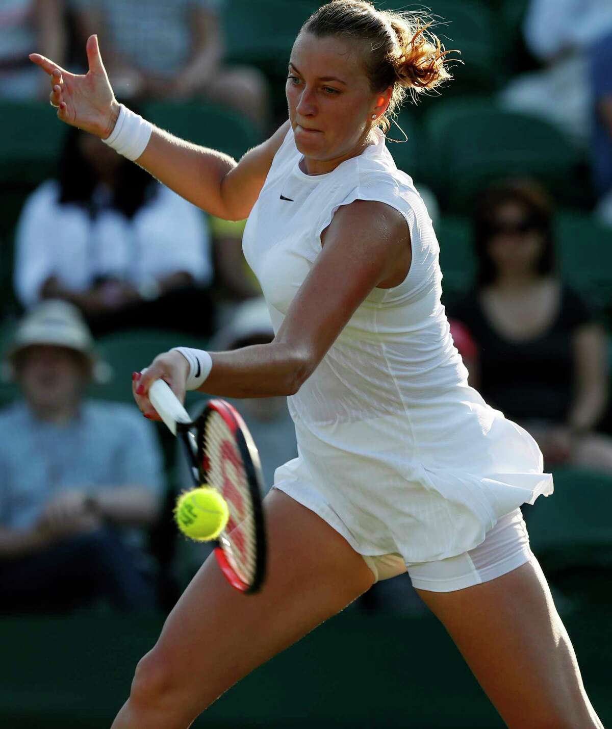 Czech Republic's Petra Kvitova returns to Madison Brengle of the United States during their Women's Single Match on day three at the Wimbledon Tennis Championships in London Wednesday, July 5, 2017. (AP Photo/Kirsty Wigglesworth)