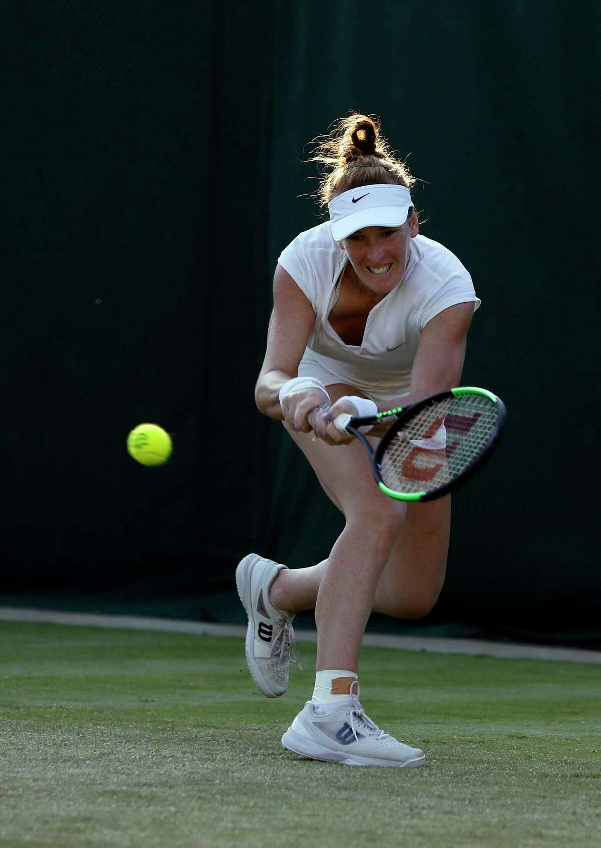 Madison Brengle of the United States returns to Czech Republic's Petra Kvitova during their Women's Singles Match on day three at the Wimbledon Tennis Championships in London Wednesday, July 5, 2017. (AP Photo/Kirsty Wigglesworth)