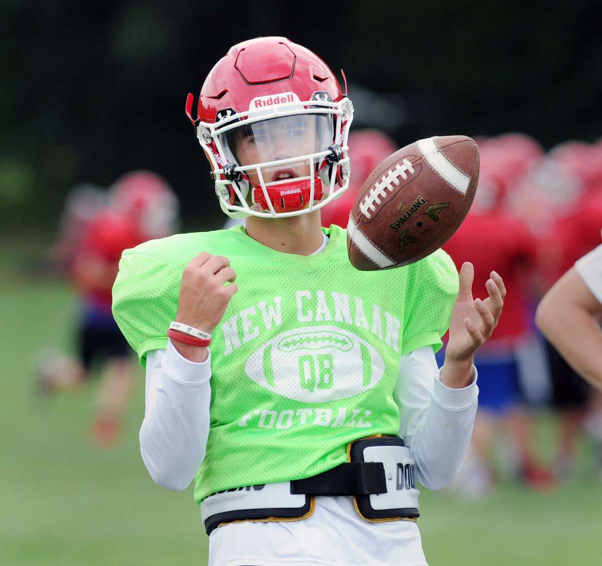 New Canaan High School quarterback Drew Pyne, a freshman, during New Canaan High School football practice at the school in New Canaan, Conn., Thursday, Sept. 1, 2016.