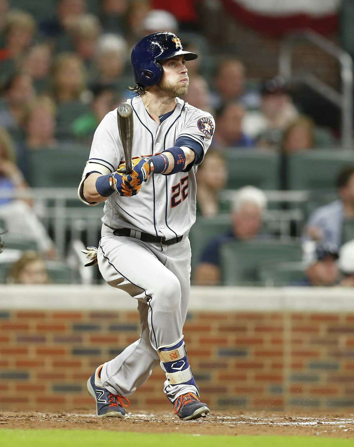 Josh Reddick launches a two-run double during the Astros' fifth inning Wednesday. He had seven RBIs in the two-game series.