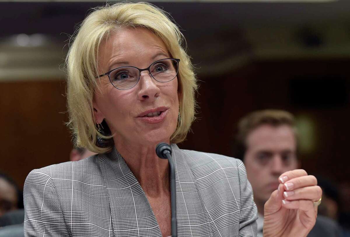 In this June 6, 2017, file photo, Education Secretary Betsy DeVos testifies on Capitol Hill in Washington before the Senate Appropriations Committee, Labor, Health and Human Services, Education, and Related Agencies Subcommittee hearing on the fiscal year 2018 budget. (AP Photo/Susan Walsh, File)