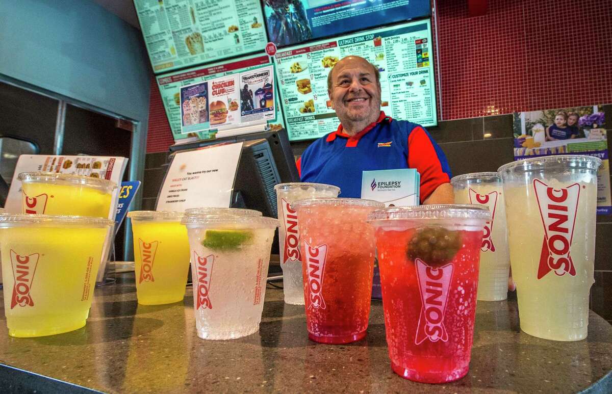 Sonic franchisee Gene Nachamkin sets out some of his lemonade products at the kick off of the "Lemonade for Livy" fund drive to benefit the local epilepsy foundation Friday June 30, 2017 in Latham, N.Y. (Skip Dickstein/Times Union)