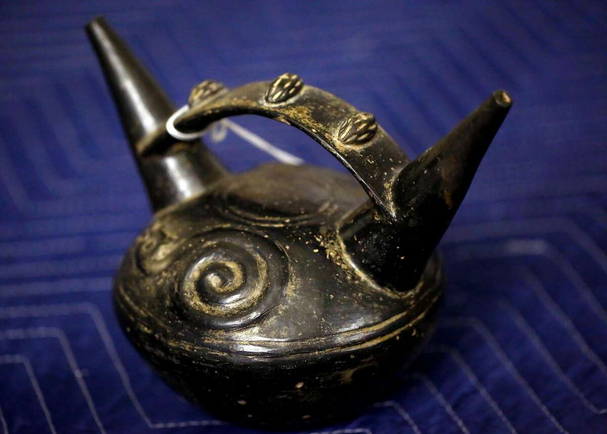 An artifact that was determined to be a forgery of a double sprout stirrup vessel from Northern Peru from 1000-1400 C.E. pictured at The Mexican Museum July 6, 2017 in San Francisco, Calif.