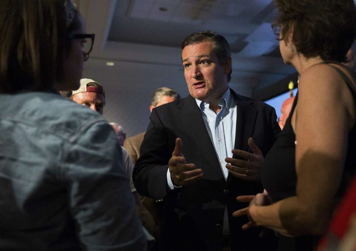 AUSTIN, TX - JULY 6: Sen. Ted Cruz (R-TX) discusses issues with concerned citizens after holding a town hall meeting on July 6, 2017 in Austin, Texas. (Photo by Erich Schlegel/Getty Images)