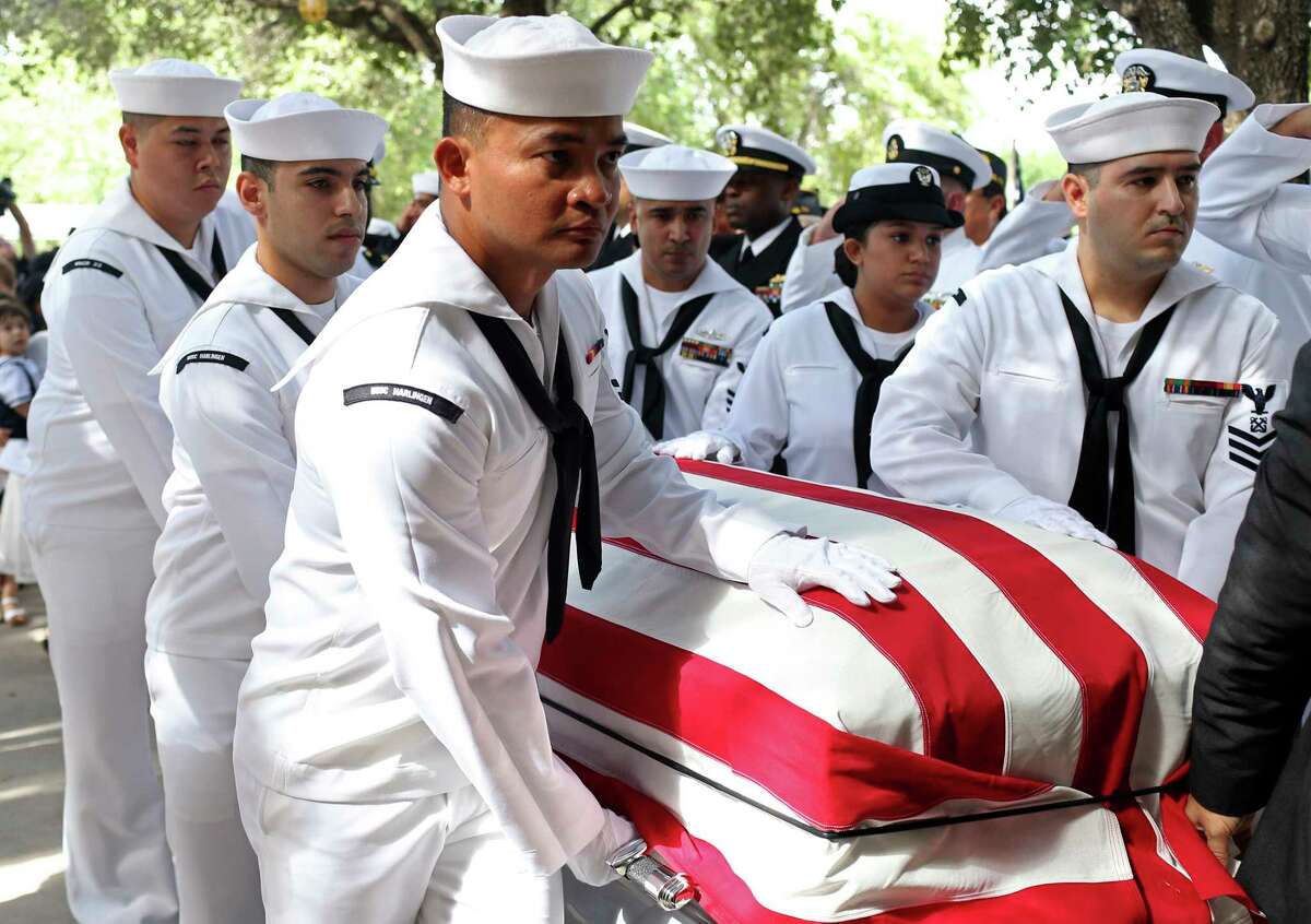 Sailors from the Harlingen U.S. Navy Operational Support Center escort the body of U.S. Navy Gunner's Mate 2nd. Class Noe Hernandez into Sacred Heart Catholic Church in Mercedes, Texas for burial services, Thursday, July 6, 2017. Hernandez, 26, died aboard the USS Fitzgerald along with six other sailors when the ship collided with Philippine-flagged container ship off the coast of Japan on June 17. Surviving Hernandez is his wife, Dora and their two-year-old son, Leon.