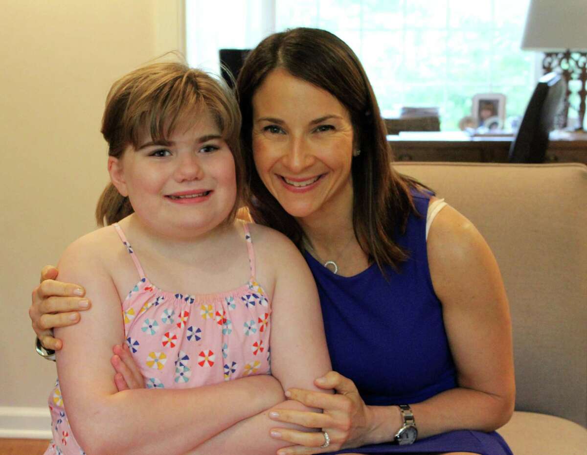 Jennifer Iannuzzi with her daughter, Sydney, who has the rare genetic disorder, Smith-Magenis syndrome.