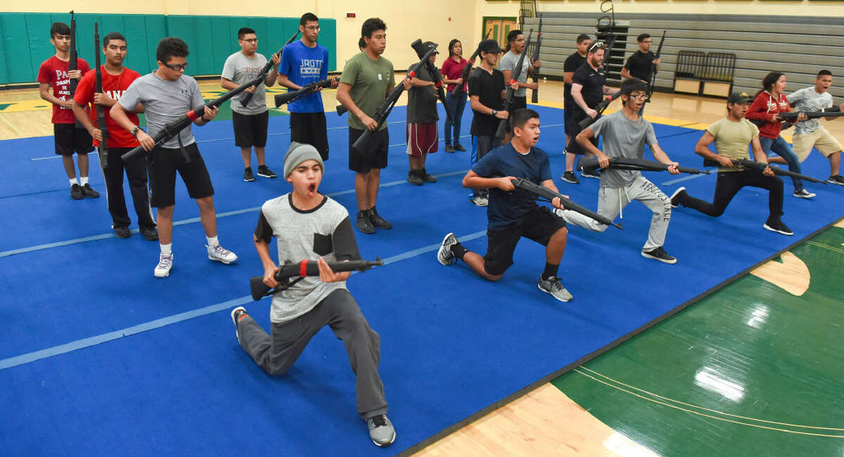 Laredo ISD high school JROTC cadets go through drills and train on Thursday, July 6, 2017 as they prepare for upcoming JROTC competitions in the new school year.