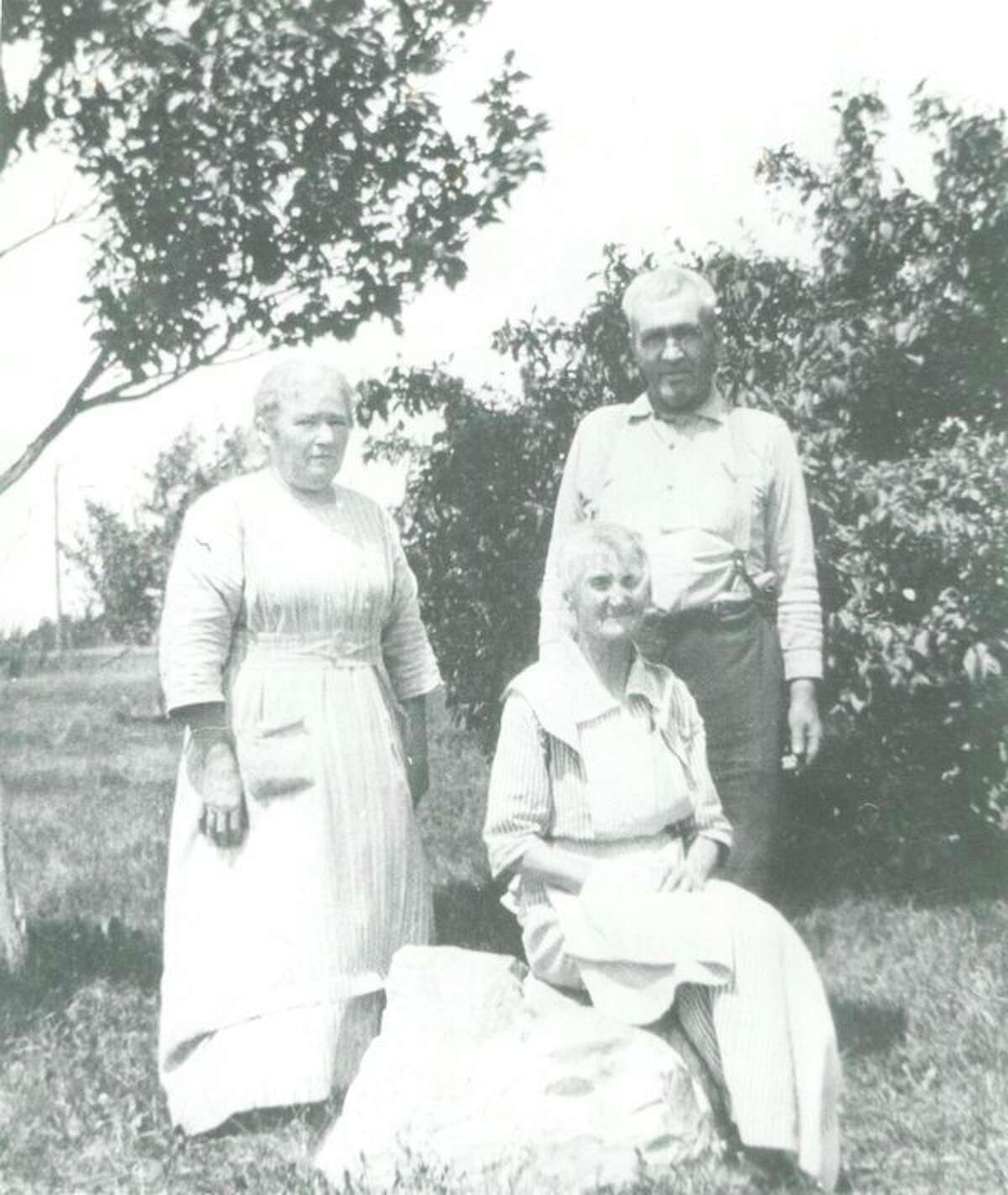 This is Rosa Andre and Cyrille Valliere standing, and Julie Andre is sitting. Rosa raised the Valliere children after the death of their mother, Mary Abear Valliere, in 1893.