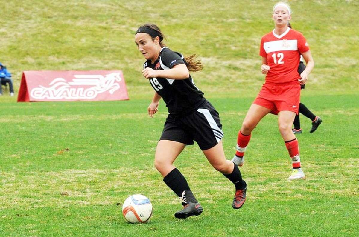 Rachel Wiesehan, left, dribbles the ball up the field in a regular season game during the 2016 fall season for Maryville University.