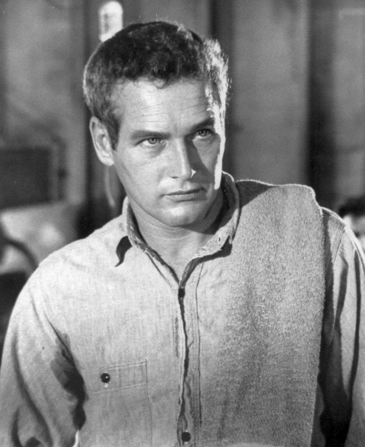 In this 1968 archive photo released by Warner Bros., actor Paul Newman played a prisoner who becomes a legend to fellow chain gang members in the movie 'Cool Hand Luke.