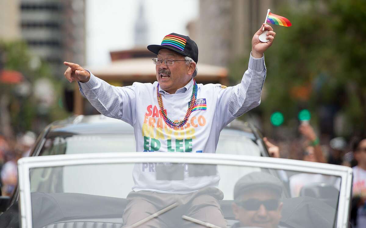 San Francisco Mayor Ed Lee waves to a cheering crowd along the San Francisco Pride Parade route in San Francisco, California on Sunday, June, 25, 2017. / AFP PHOTO / Josh EdelsonJOSH EDELSON/AFP/Getty Images