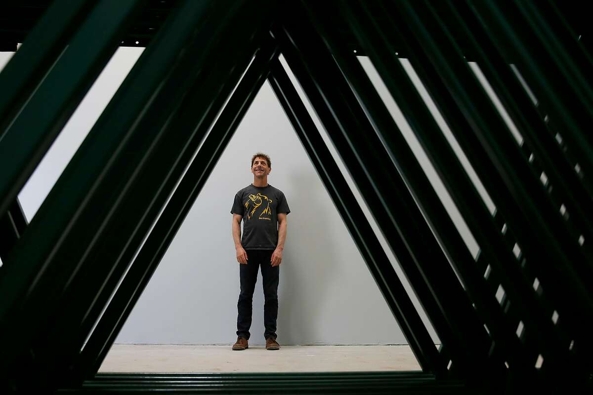 Ron SilbersteinAdmiral Maltings co-founder, is framed by unassembled storage racks as he stands for a portrait at Admiral Maltings on Monday, June 26, 2017 in Alameda, Calif.