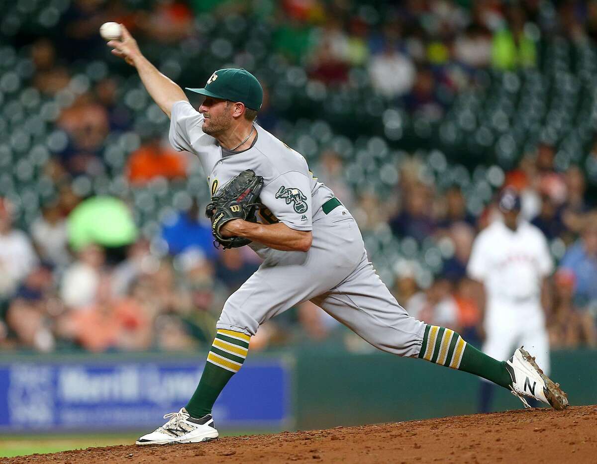 Oakland Athletics starting pitcher Chris Smith (56) pitches during the sixth inning of an MLB game at Minute Maid Park, Monday, Aug. 29, 2016, in Houston. ( Jon Shapley / Houston Chronicle )