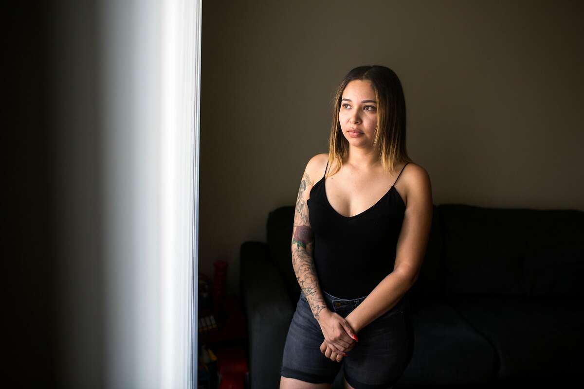 Michelle Morales, 28, stands for a portrait in her home on July 7, 2017, in Los Angeles, California. She was abused by her mother's boyfriend for seven years as a child and sought to have the man prosecuted when when she was 25. In February he was sentenced to serve 160 years. She is opposed to a bill in the legislature that would allow some sex offenders to come off the registry.