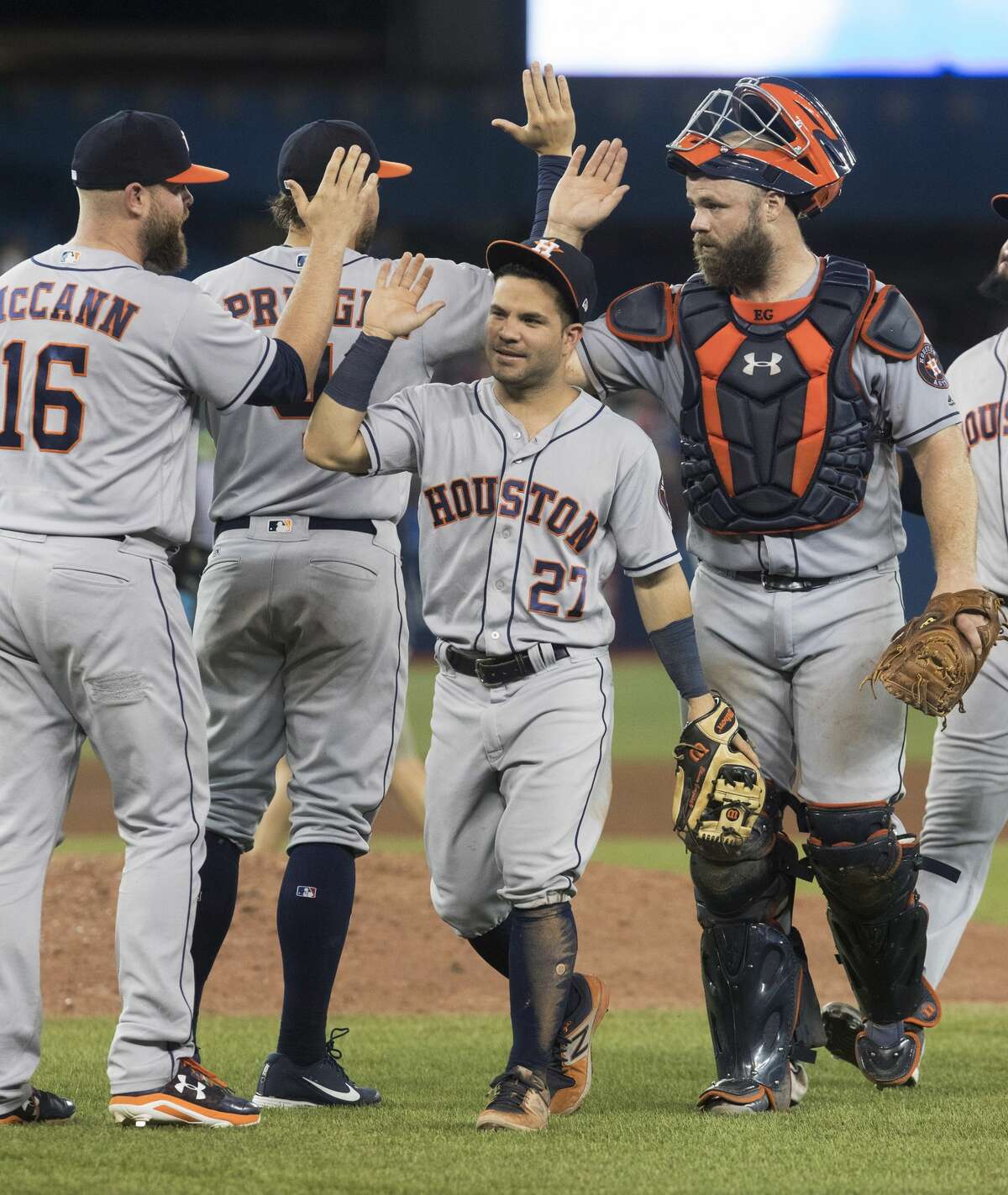 The Houston Astros celebrate after defeating the Toronto Blue Jays 12-2 in a baseball game Friday, July 7, 2017, in Toronto. (Fred Thornhill/The Canadian Press via AP)