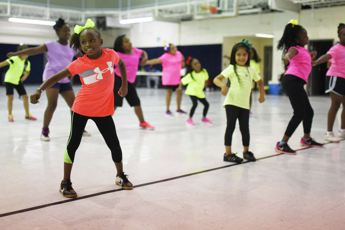 Camp participants put on a show after a week of cheerleading camp Friday, July 7, 2017, at the Greater Ideal Life Center. James Durbin/Reporter-Telegram