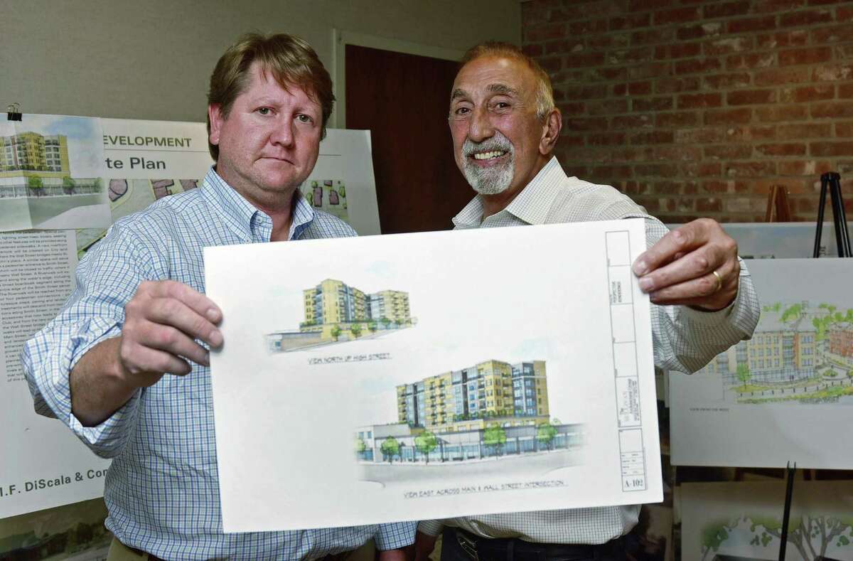 Jason Enters of EDG Properties and Michael DiScala of M.F. DiScala & Co. submit conceptual plan for Head of the Harbor North, which calls for a new five-story, 80-unit building with 200 parking spaces along High Street on the site of a municipal parking and a two-story retail building along Main Street.